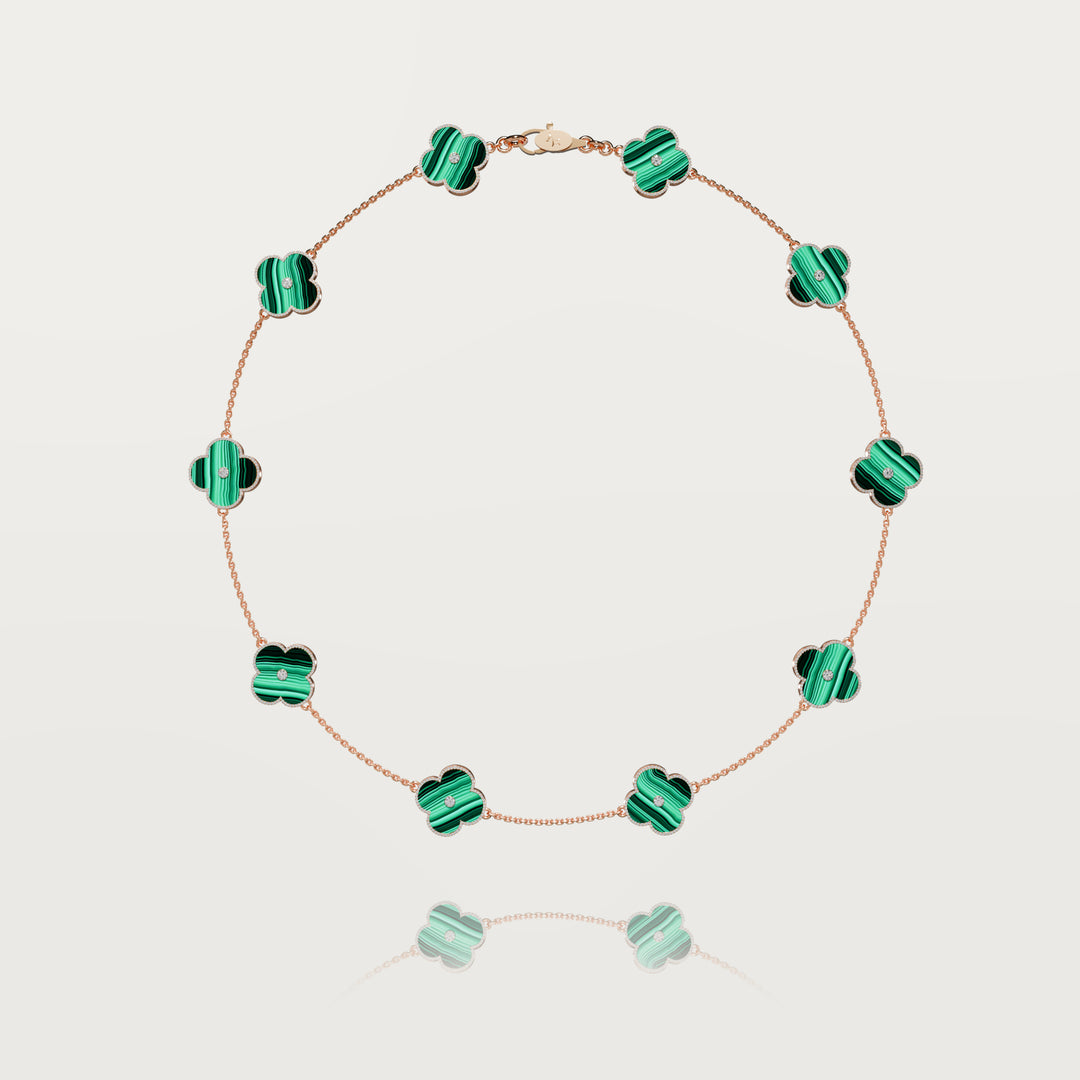 Solitaire glow multi clovers necklace 