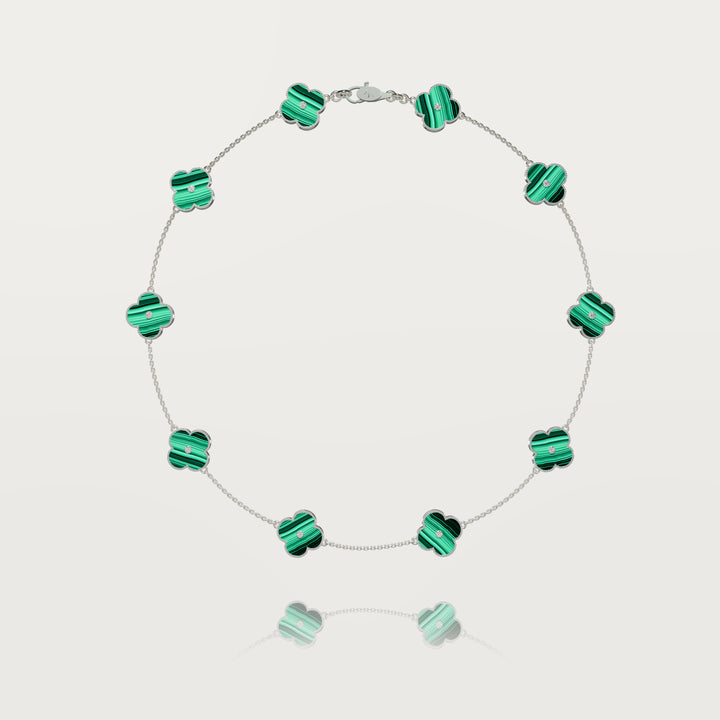 Solitaire glow multi clovers necklace 