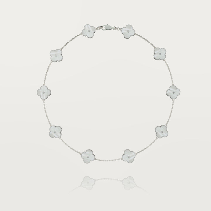 Solitaire glow multi clovers necklace 