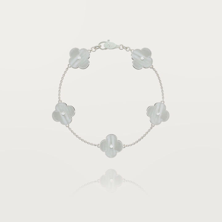 Solitaire glow multi clovers bracelet 